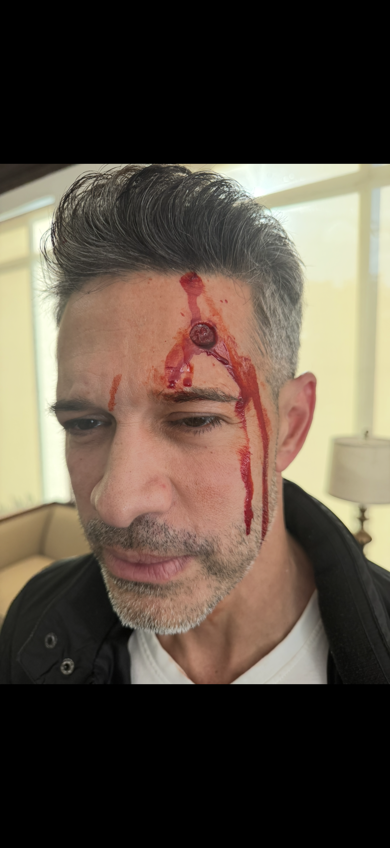 Bullet Hole prosthetic applied and painted